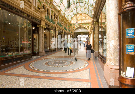 dh City Centre LEEDS WEST YORKSHIRE Victoria Quarter mosaic floor shopping arcade shoppers strolling walkway uk interior mall people victorian england Stock Photo