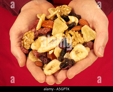 MAN HOLDING TRAIL MIX Stock Photo