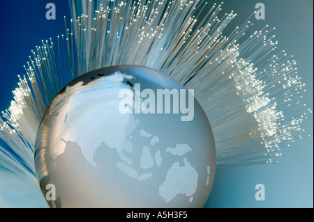 Fiber optical cables and globe Stock Photo