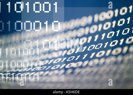 Computer binary code of ones and zeros displayed on a digital screen ...