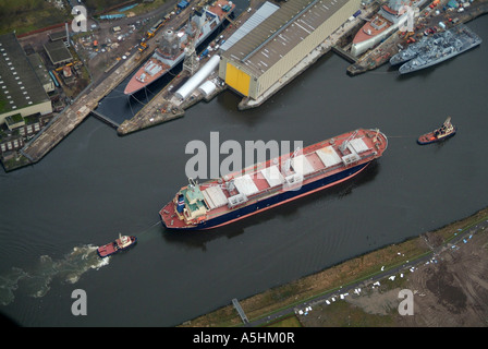 Ship being escorted up the river Clyde, Glasgow February 2007 Stock Photo