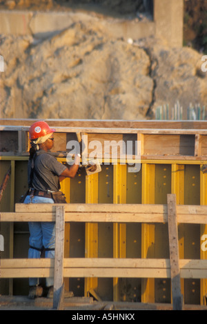 Detroit Michigan A construction worker prepares the form for a concrete bridge support on Interstate 94 Stock Photo