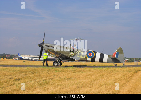 Spitfire at Farnborough 2006 on runway apron awaiting taxi clearance for take off Stock Photo