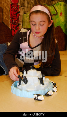 Nine year old school pupil at Feltham Hill Junior School engaging in a problem solving day involving large puzzles Stock Photo