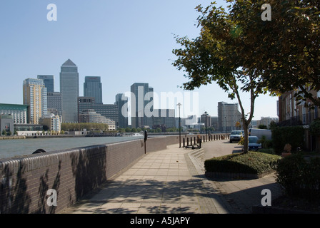 Low rise riverside housing with own service road directly opposite Canary Wharf docklands area Stock Photo