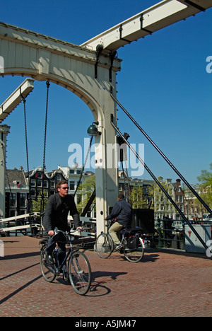 Magere brug or the Skinny bridge double drawbridge spanning the river Amstel since 1672 Amsterdam Netherlands Holland EU Europe Stock Photo