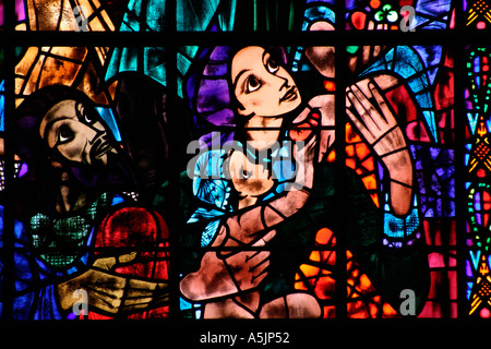 Stained Glass window by Ervin Bossanyi depicting peace among the nations of the world Canterbury Cathedral Stock Photo