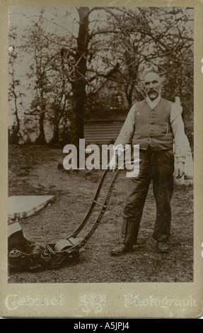 Gardener in 19th century clothes working in the walled garden
