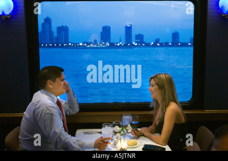 Couple enjoying a Dinner Cruise on the Odyssey in Chicago Illinois Stock Photo