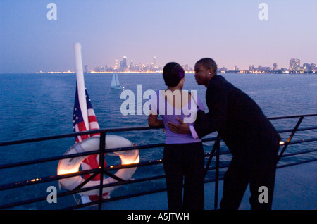 Couple enjoying a Dinner Cruise on the Odyssey in Chicago Illinois Stock Photo