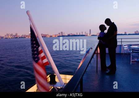 Couple enjoying a Dinner Cruise on the Odyssey in Chicago Illinois Stock Photo