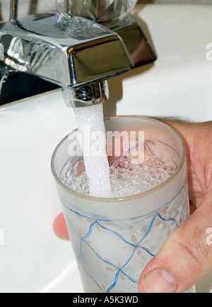 Filling Water Glass Stock Photo