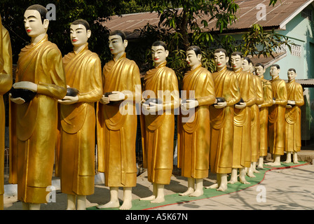 Statues of monks in a monastery, Yangon, Myanmar Stock Photo