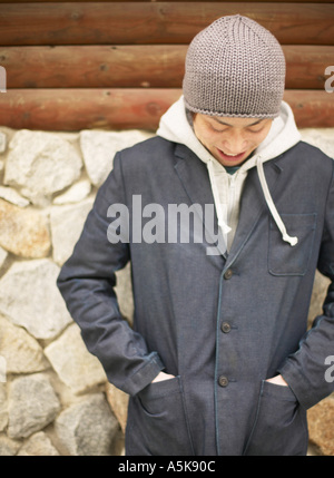 Young man looking down Stock Photo