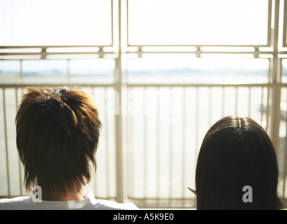 Young couple sitting together Stock Photo