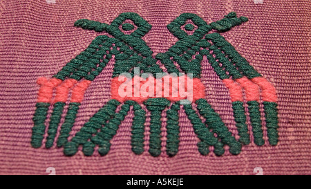 Detail of a brocaded double headed bird on a Maya textile A woven cloth from San Pedro Sacatepequez Guatemala Stock Photo