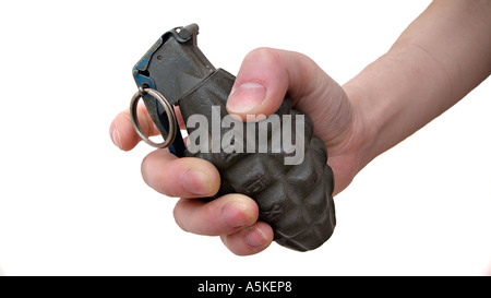 Hand grasping a hand grenade Familiar pineapple form M21 grenade as manufactured by the Richmond Foundry Mfg Co Inc USA Stock Photo