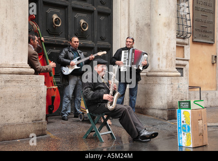 Group of Buskers on a side street in Rome Italy Stock Photo