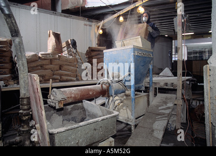 Worker mixing cement for Random House building at 1745 Broadway in New   York City Stock Photo