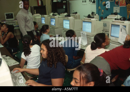 High school students work on projects in the computer lab in New York City Stock Photo