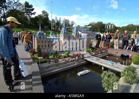 Tourists seeing small miniature of Amsterdam city at Madurodam Den Haag Netherlands Holland Europe EU - raj 98770 Stock Photo