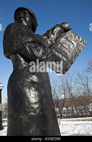 Women are Persons! Statue of suffragette Nellie McClung holding an October 18 1929 newspaper declaring women to be persons Stock Photo