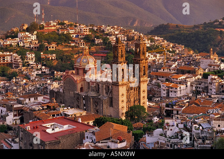 Church of Santa Prisca, designed by Miguel Custodio Duran, at sunset, view from Church of Guadalupe, Taxco, Mexico Stock Photo