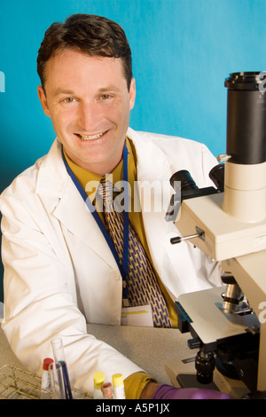 Researcher or lab worker enjoys his work. Stock Photo