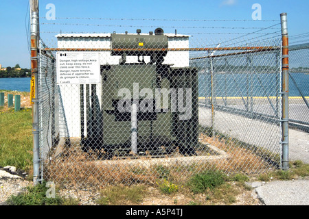 A caged oil cooled electricity Transformer Stock Photo - Alamy