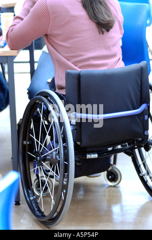 Disabled woman in wheelchair London UK Stock Photo