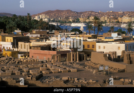 Ruins of Yebu on Elephantine Island with Aswan in the background, Aswan, Egypt Stock Photo