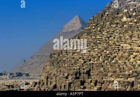 Pyramid of Khufu in front of Pyramid of Khafre with limestone covering at the summit, Pyramids of Giza, Cairo, Egypt Stock Photo