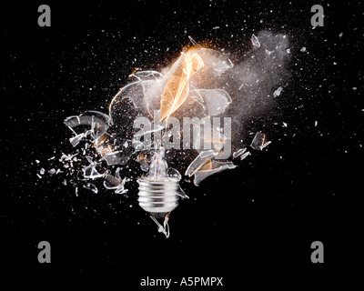 Exploding light bulb Stock Photo