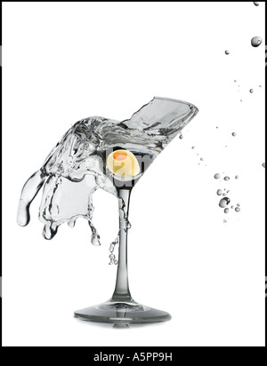 Exploding martini glass Stock Photo