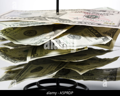 Close-up of currency notes on a metal spike Stock Photo