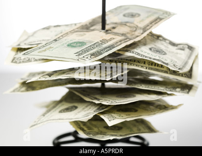 Close-up of currency notes on a metal spike Stock Photo