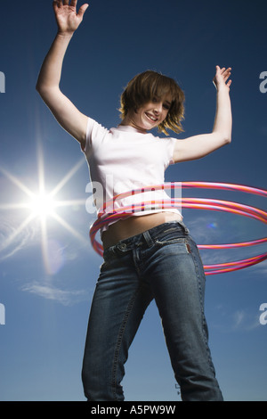 Hula hoop around waist hi-res stock photography and images - Alamy