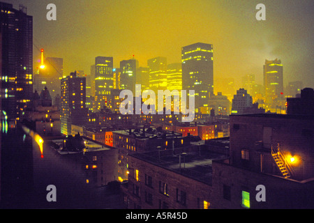 United States of America New York City NYC NY Manhattan skyscrapers and rooftops at night JMH0222 Stock Photo