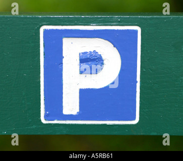 green wooden sign in the a park with copy space concept Stock Photo - Alamy