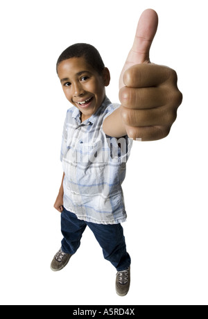 boy showing thumbs up Stock Photo - Alamy