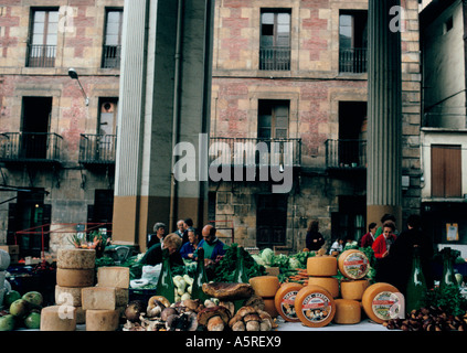 BASQUE COUNTRY DISPLAY OF WILD MUSHROOMS CIDER SHEEPS MILK CHEESE ORDIZIA'S WEDNESDAY MARKET, SPAIN Stock Photo