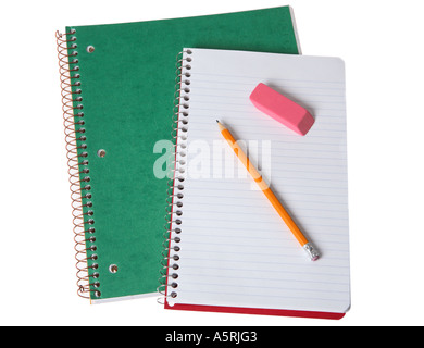 School notebooks with pencil and eraser on open blank page. Stock Photo