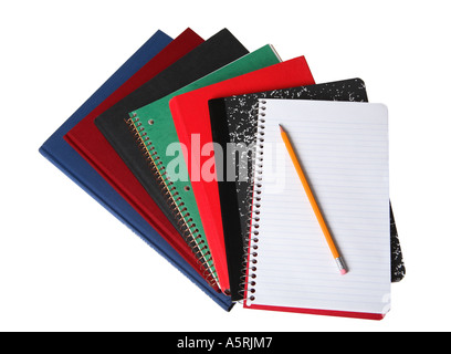 Stack of school notebooks with pencil on top. Stock Photo