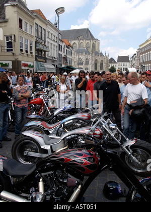 A group of radical custom built Harley Davidson choppers on the Grote Markt square in Breda the Netherlands Stock Photo
