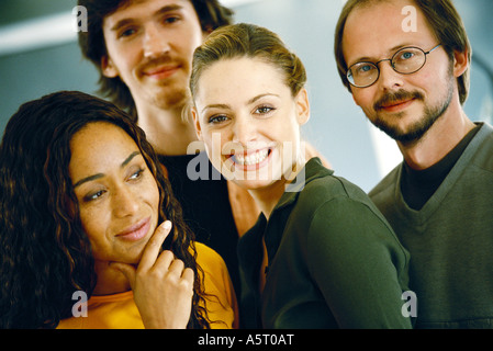 Four young adults, casually dressed, portrait Stock Photo