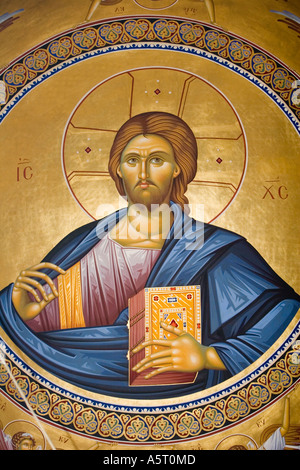 Jesus holding book I am the Light of the World illustration old church Crete Krete island Greece Stock Photo