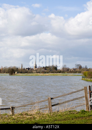 View across the river Thames in full flood towards Lechlade Gloucestershire UK Stock Photo