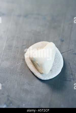 Heart shaped stone and round pebble Stock Photo
