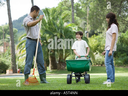 Family doing yardwork Stock Photo