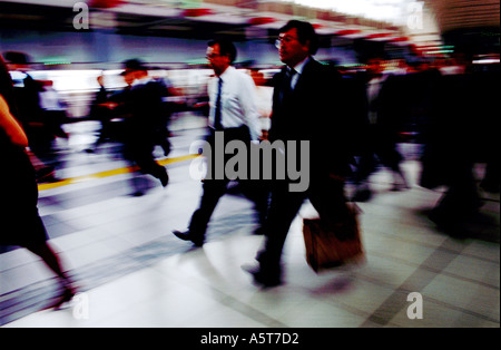 Commuters rush to work in Tokyo Japan Stock Photo